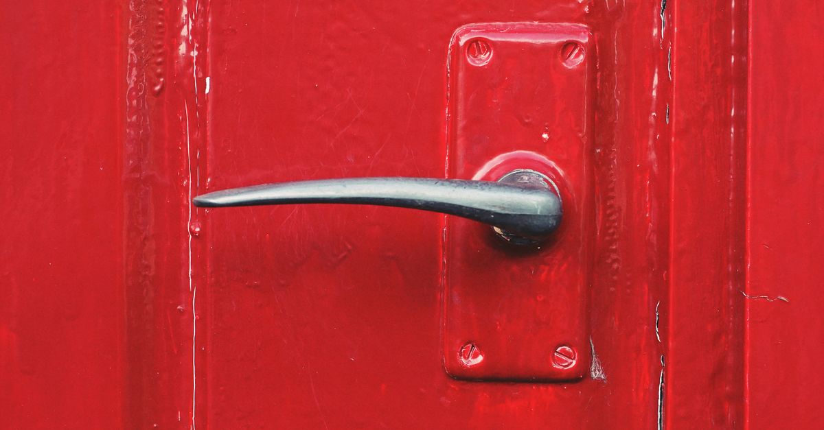 locksmith unlocking front door — Rockaway Locksmith Corp